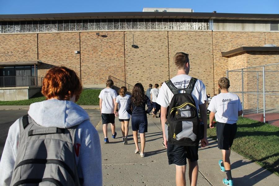Students file into C-G toward the end of their gym period. Particularly when gym classes are outside, some students are feeling rushed by the shortened five-minute bell.