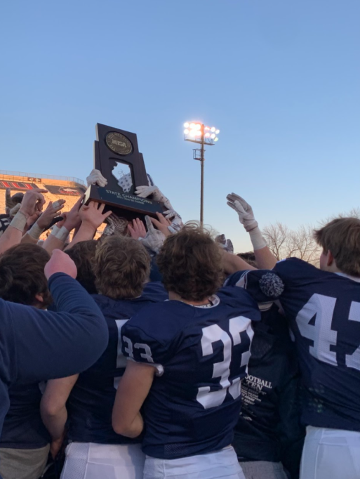 Trojans hold off Flyers in all-time classic to clinch state title