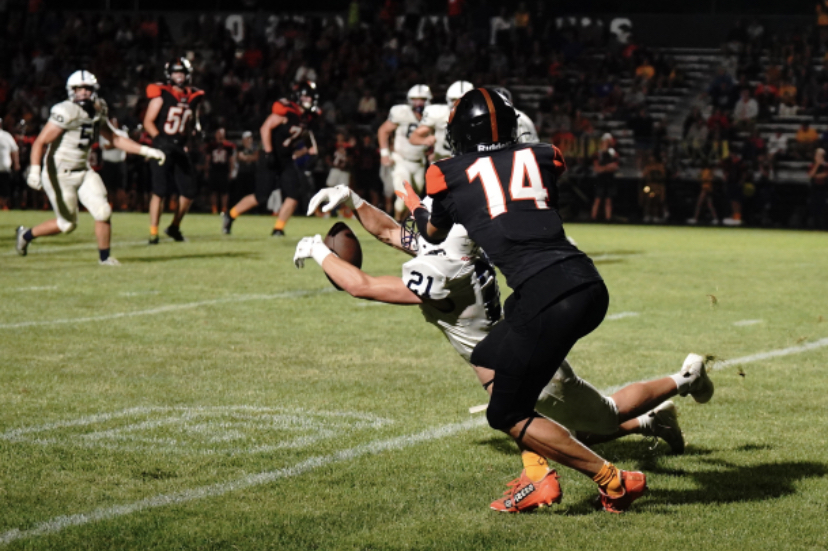 Senior cornerback PJ Weaver breaks up a touchdown pass in the fourth quarter against Crystal Lake Central.