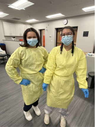 Certified Nursing Assistant program students Olivia Artman and Isabella Martinez in Crystal Lake Central's CNA training lab.